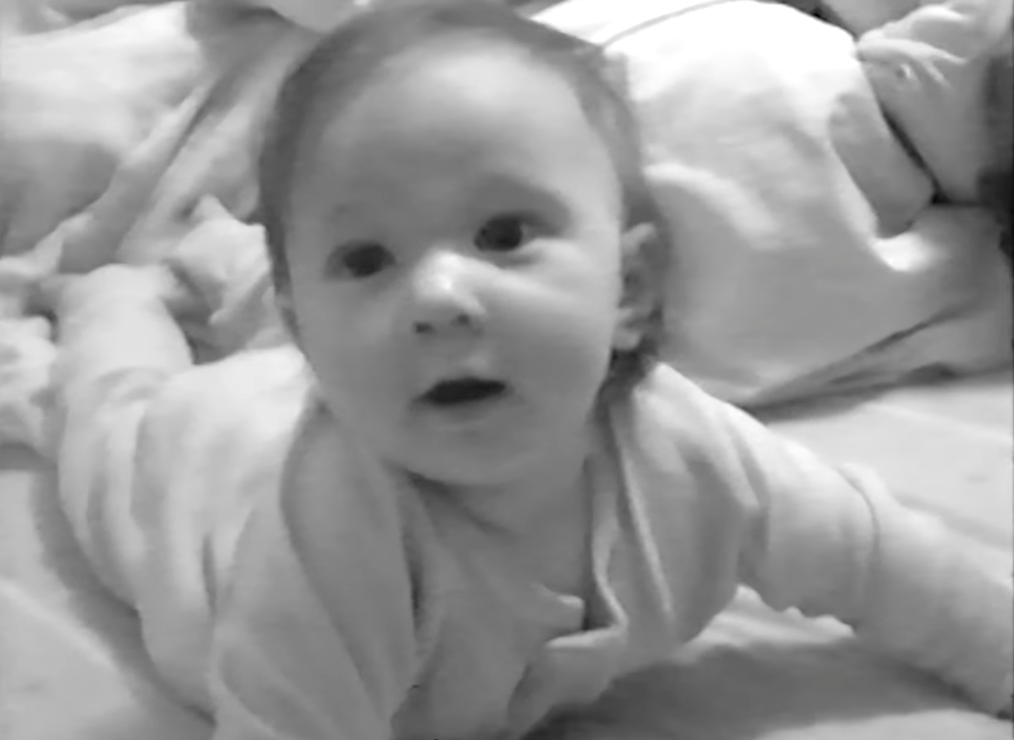 Baby Akiane looking into the camera