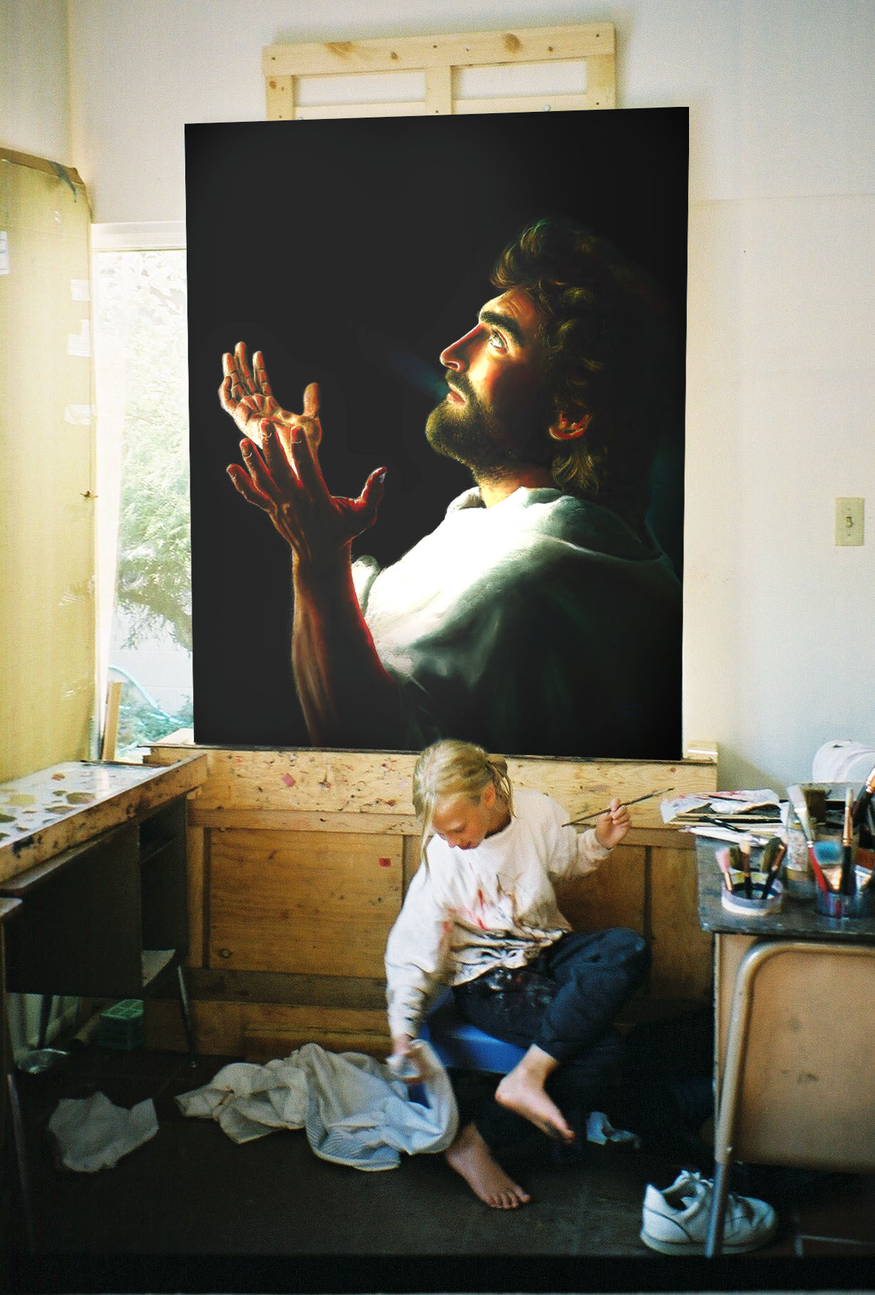 Akiane seated beneath her painting Father Forgive Them
